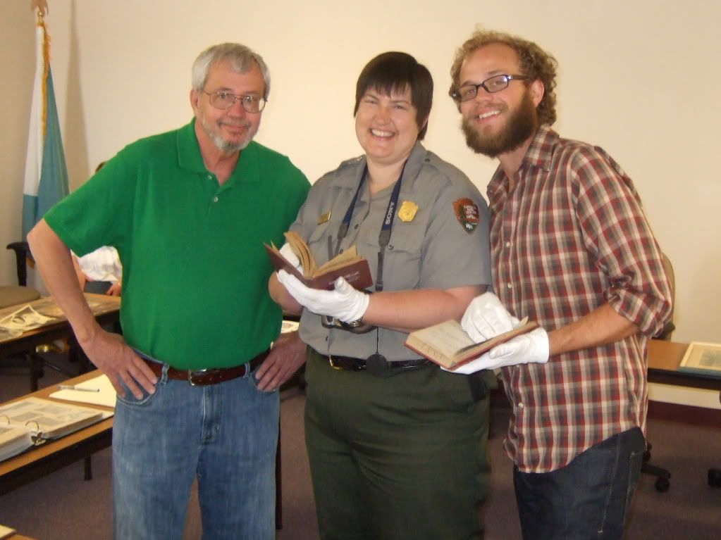 Jim McGuire (L)--Supt Boles grandson and Bo McGuire (R)--grandson stand with CAVE Mgt Assitant Paula Bauer