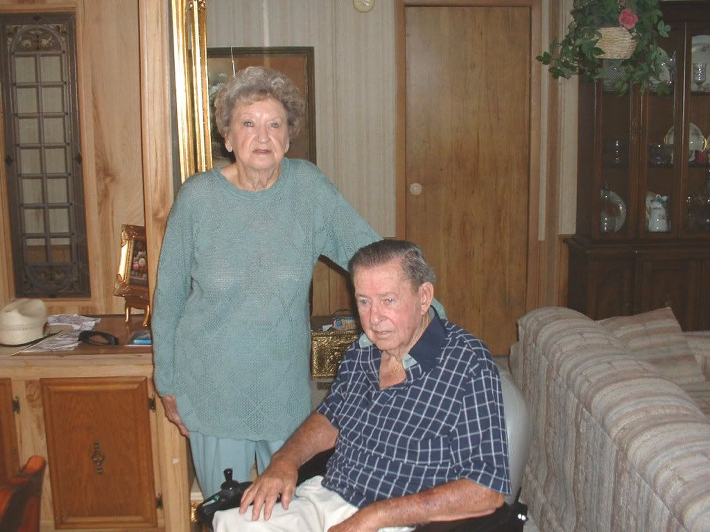 Jim White Jr. and his wife at home, July 23, 2003