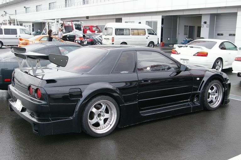 http://i58.photobucket.com/albums/g277/sidewazegtst/Car%20Pics/WidebodyBLKGTSPic1.jpg