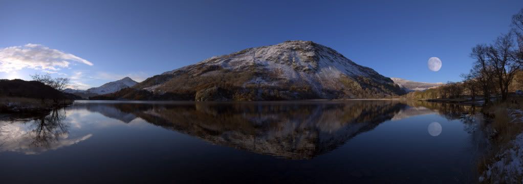 IMAGE: http://i58.photobucket.com/albums/g280/acmunro/best/40-mountainreflections.jpg